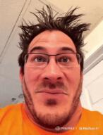 ai_generated camera glasses irl laughing markiplier messy_hair stubble variant:markiplier_soyjak // 600x787 // 3.9MB