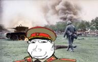 closed_mouth clothes collar_tabs communism ear epaulettes eyelids fire glasses gun hammer_and_sickle hat irl_background military military_cap military_uniform necktie peaked_cap small_eyes smile smoke soviet_army_uniform soviet_union soyjak star stubble subvariant:massjak subvariant:wholesome_soyjak tank uniform variant:gapejak // 695x441 // 365.6KB