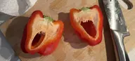 2soyjaks cutting_board irl irl_background irl_soy knife open_mouth pareidolia pepper pepperjak seed series:irl_soyjaks soyjak teeth_showing thing variant:pepperjak variant:unknown // 3304x1500 // 1.4MB