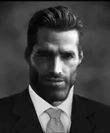chiseled_jawline closed_mouth clothes ear gray_skin grayscale grey_background grey_skin greyscale hair lips looking_at_you nas:gigachad necktie nose slicked_back_hair stubble suit
