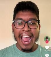 accessory beard chinktok clothes ear earbuds fnf_pedo glasses hair irl kevintzen looking_at_you lreemsskev meta:nas meta:variant_origin nigger open_mouth shitskin stubble subvariant:redrawn_chudplier subvariant:redrawn_plier teeth tiktok tongue tongue_out video // 1080x1192 // 115.3KB