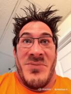ai_generated animated closed_eyes crazy ear glasses grey_eyes gun hailuo_ai hair hand holding_object irl laughing looking_at_you messy_hair pointing pointing_at_viewer psycho revolver soyjak teeth text variant:markiplier_soyjak // 600x787 // 11.5MB