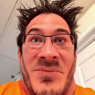 animated closed_eyes crazy ear glasses grey_eyes gun hailuo_ai hair hand holding_object irl laughing looking_at_you messy_hair meta:ai_generated pointing pointing_at_viewer psycho revolver soyjak teeth text variant:markiplier_soyjak // 600x787 // 11.5MB