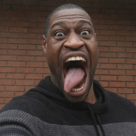 black_skin brick_wall dark_skin george_floyd hoodie meta:ai_generated negro nigger no_glasses open_mouth photo realistic series:saint_floyd tongue_out variant:bernd // 1024x1024 // 1.4MB