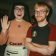 2soyjaks avengers beanie beard crossed_arms female hair irl meta:ai_generated nate that_one_fucking_picture_of_nate_being_a_smug_little_bastard variant:soyak variant:soytan wave waving yellow_hair // 1024x1024 // 1.9MB