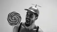 animated happy lollipop meta:ai_generated meta:low_resolution monochrome nas:gigachad open_mouth overalls propeller_hat smile tongue tongue_out // 255x143 // 333.0KB