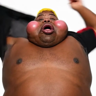 ai_but_not_completely_ai_doe award big_lips big_nose black_skin blond blush character:hunky clothes ext=mp4 eyebrows fat general hair meta:ai_generated microphone open_eyes realistic series:fusionjaks speech subvariant:branigger subvariant:fat_alicia subvariant:hunky_twink_sex_machine variant:alicia variant:brandon video white_background // 560x560, 6s // 1.4MB