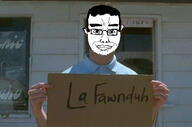 arm cardboard closed_mouth clothes ear glasses hair holding_object holding_sign irl kip lafawnduh napoleon_dynamite sign smile soyjak subvariant:chudjak_front text variant:chudjak // 720x475 // 66.7KB