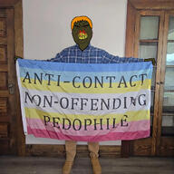 anti_contact_non_offending_pedophile arm brown_skin connor_gardner_weston deflowered_dutch_dyke_(transexual) flag flag:minor_attracted_person fucked_up_nigger_hands holding_flag irl leg orange_hair seething shoe text variant:alicia zarty zartycuck // 1024x1024 // 233.4KB