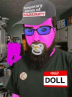 admin beard blue_glasses button clothes doll_(user) hat irl irl_background kolyma name_tag pacifier pink_skin soyjak soyjak_party variant:unknown // 474x632 // 405.9KB