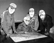 4soyjaks arm chester_w_nimitz closed_mouth clothes concerned frown glasses hand irl looking_down map military mustache pointing soyjak stubble table uniform united_states variant:a24_slowburn_soyjak variant:gapejak variant:markiplier_soyjak variant:soyak // 640x502 // 61.0KB