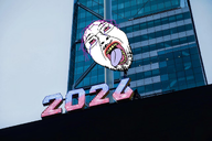 2026 ack ball crying dying head irl_background new_year new_york number purple_hair purple_tongue red_eyes skyscraper stubble tranny troonella variant:bernd yellow_teeth // 1280x853 // 818.0KB