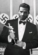 clothes germany happy meta:Not_OC nas:gigachad national_socialism nazism smile suit third_reich trophy // 696x1024 // 782.4KB