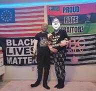 arm bbc black_lives_matter country flag full_body glasses hair hand holding_object irl_background kris_kane pan_african proud_race_traitor_r purple_hair queen_of_spades raised_fist_(symbol) smile soyjak star stubble united_states variant:bernd // 1080x1021 // 1.4MB