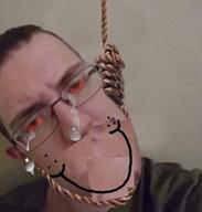 NIGGY_TEH_203_IS_A_RAPEBABY ack alternate anhero bloodshot_eyes closed_mouth clothes crying dead ear glasses hair hanging irl irl_background jartycuck patrick_crusius rope smile soyjak subvariant:chudjak_front suicide variant:chudjak // 500x524 // 90.0KB