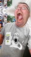 arm bernd_schmidt clothes coronavirus_pandemic glasses goy hand holding_object holding_phone internet_is_leaking iphone irl merchandise open_mouth phone qr_code soyjak stubble subvariant:phoneplier subvariant:phoneplier_vertical tshirt vaccine variant:gapejak variant:markiplier_soyjak // 1069x1970 // 2.0MB