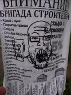 clothes cyrillic_text glasses hand holding_object irl open_mouth redraw soyjak stubble tagjak text tshirt variant:markiplier_soyjak // 960x1280 // 1.6MB