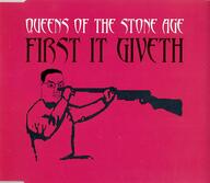 album_cover arm closed_mouth first_it_giveth_(album) glasses gun hair hand holding_object music queens_of_the_stone_age rifle soyjak suicide text variant:chudjak // 537x466 // 351.9KB