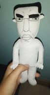 artist:soyjakfan01 chud eyebrows front_facing glasses hair irl_background irl_image irl_soy lips looking_to_the_right nose plush plushie soyjakfan01 subvariant:chudjak_front variant:chudjak // 679x1280 // 70.4KB