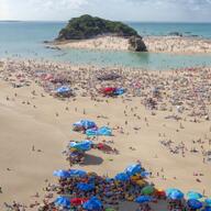 beach eduardo_foltz meta:ai_generated meta:nas rock sand sea umbrella variant:carterjak variant:kuzjak // 1024x1024 // 295.4KB