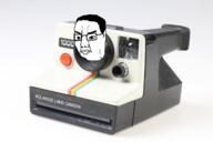 angry camera closed_mouth glasses hair objectsoy pol_(4chan) polaroid pun soyjak variant:chudjak // 1280x853 // 603.9KB