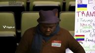 clothes faggot fat fat_nigger hat hello_my_name_is_(sticker) irl jimbo_(namefag) meta:ai_generated meta:namefags nigger scarf science text variant:meximutt video viggle whiteboard // 1280x720, 59.6s // 6.3MB