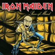 album_cover angry anorexia blue_eyes bone chain chains clothes crazed drawn_background full_body glasses insane iron_maiden lock metal_(music) music open_mouth padded_cell piece_of_mind schizo skeleton soyjak straightjacket stubble text variant:feraljak yellow_skin yellow_teeth // 1414x1414 // 3.7MB