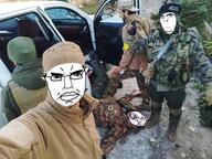 HTS SNA ack camouflage car free_syrian_army full_body glasses hair irl_background open_mouth pointing_up selfie soyjak subvariant:chudjak_front syria syrian_civil_war teeth tongue tongue_out tranny variant:bernd variant:chudjak variant:cobson war // 1280x960 // 209.8KB