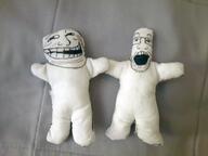 doll full_body glasses irl open_mouth plush rage_comic soyjak stubble trollface variant:markiplier_soyjak // 4000x3000 // 668.0KB