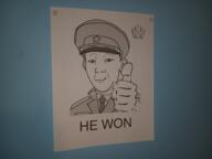 cap closed_mouth clothes collar_tabs ear hand hat irl kgb kolyma logo necktie paper poster propaganda smile smirk soyjak star text thumbs_up uniform variant:kuzjak // 960x720 // 607.1KB