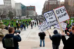 michael_protest_in_some_city_signs_irl_photo_OC.png
