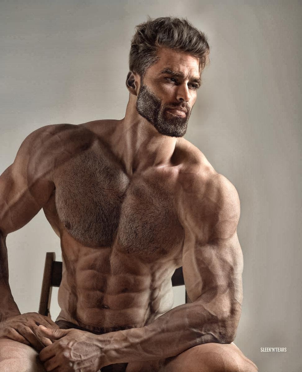 gigachad, abs, beard, buff, chair, closed mouth, ernest khalimov, hair, half body, looking to the right