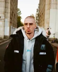 chudjak, irl soyjaks, natural ocurring soyjaks, 1soyjak, brown eyes, brown hair, closed mouth, friendly thug, front view, glasses
