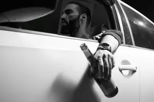 gigachad, 1nas, beard, black hair, buff, car, closed mouth, driving, drunk, drunk driving