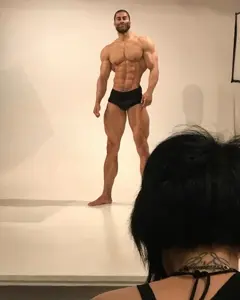 gigachad, beard, black hair, buff, closed mouth, ernest khalimov, front view, full body, hair, irl background