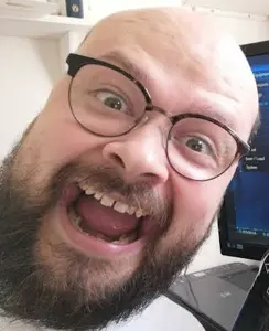 its out get in here, irl soyjaks, bald, beard, computer, eyebrows, glasses, head, irl background, looking at you