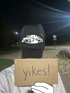 gapejak, wholesome soyjak, 1soyjak, crying, front view, glasses, holding object, holding sign, irl background, irl photo