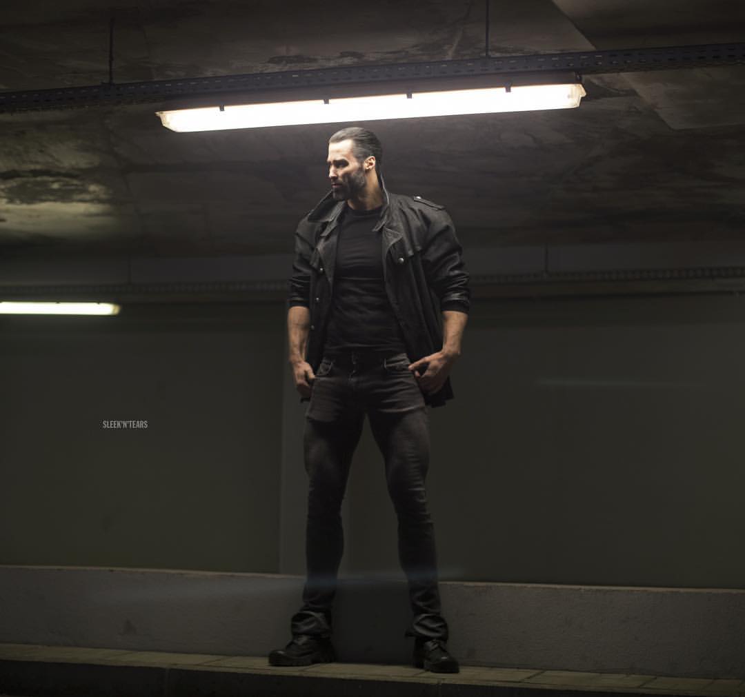 gigachad, classic gigas, beard, black hair, buff, closed mouth, clothed, clothes, ernest khalimov, full body
