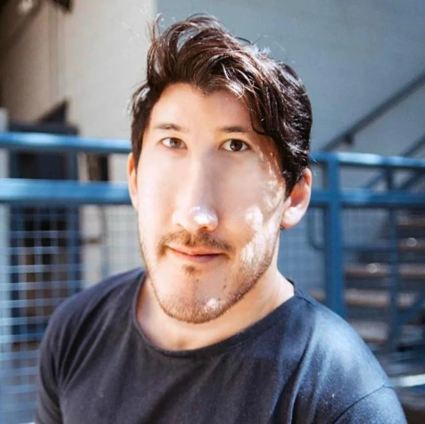 markiplier soyjak, irl soyjaks, 1soyjak, blue shirt, brown hair, chink, closed mouth, clothes, fence, front view
