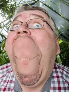 gapejak, wholesome soyjak, bernd schmidt, closed mouth, glasses, hair, realistic, smile, soyjak, stubble